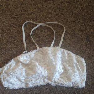 A white lacy around the neck bralette